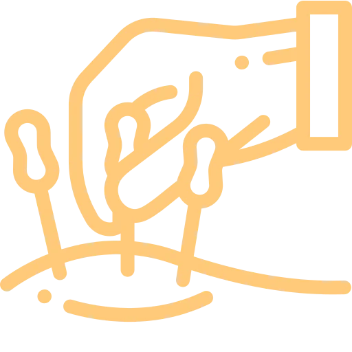 Line drawing of a hand holding a needle, inserting it into an arm with two other needles already placed.